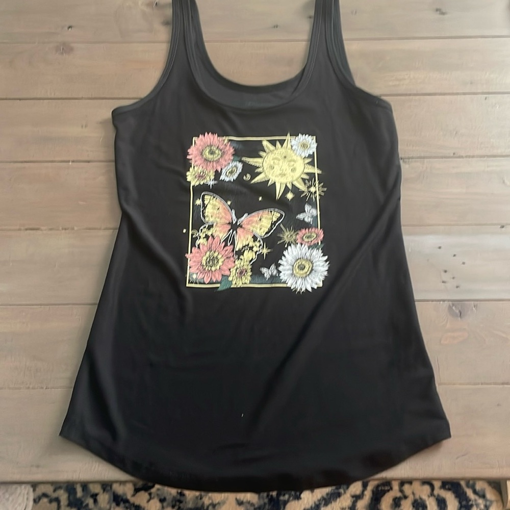 Black tank top with butterflies and flowers on the front